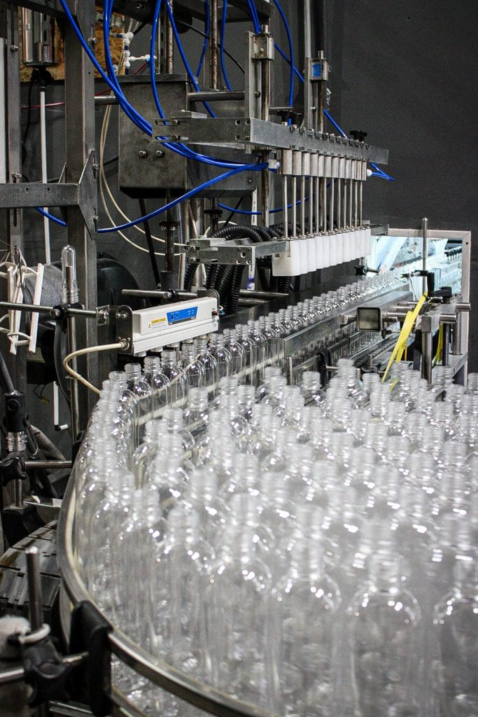 Bottles on Texas Water House’s filling line